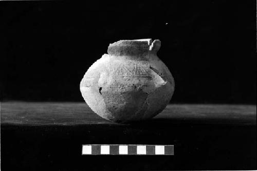 Ceramic vessel with press mold lines and dots from Site 131