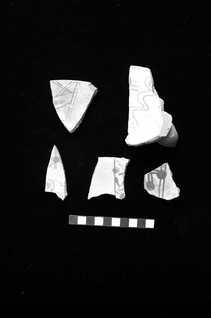 Ceramic sherds with red brown on white slip from Sites 110, 120 and 14