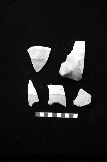 Ceramic sherds with red brown on white slip from Sites 110, 120 and 14