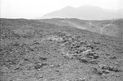 Rock pile and borrow pits above canal (Feature 9) and Sites 87 and 88 on bajada promontory