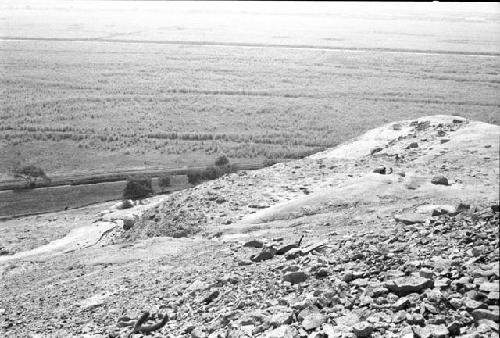 Platform with segmented conical adobes on west side of ridge at Site 93, containing Units 57 and 58