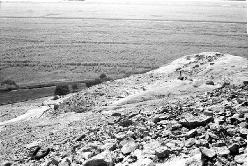 Platform with segmented conical adobes on west side of ridge at Site 93, containing Units 57 and 58