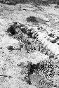 Detail of chamber wall and fill at north corner of top of huaca at Site 127