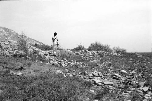 Construction below northwest end of huaca at Site 124