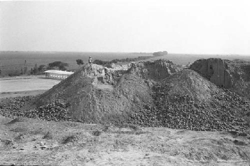 Adobe extraction site at east end of north face of Palacio (Structure A) at Site 128