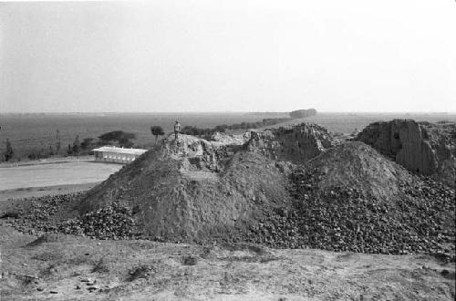 Adobe extraction site at east end of north face of Palacio (Structure A) at Site 128