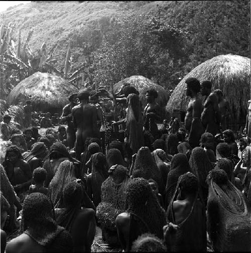 Women at funeral ceremony