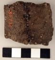 Ceramic rim sherd, mended, plain