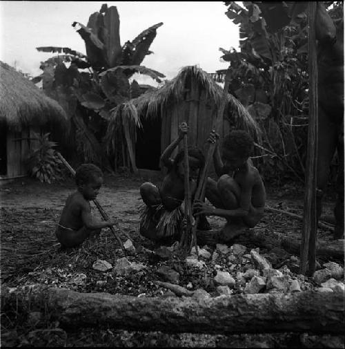 Children helping build the haksé