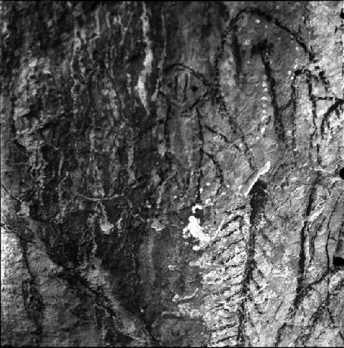 Stone drawing -- damaged negative, holes on right side of image