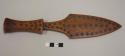 Carved dagger with pattern of incised circles