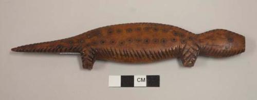 Carved pangolin with pattern of incised circles