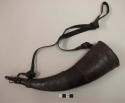 Powder horn with leather covering, leather strap, horn or bone stopper