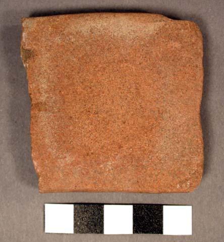 Abrading stone or pallette. rectangular slab. probably broken at 1 end. 1 concav