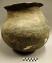 Large undecorated pottery jar--restorable