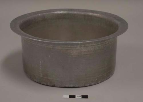 Aluminum cooking pot, round, everted rim; third of nesting set of 12 pots with lids; impressed mark of crossed arrows with crown above, illegible words above and below