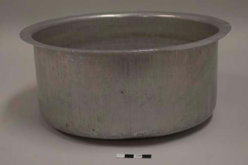 Aluminum cooking pot, round, everted rim; sixth of nesting set of 12 pots with lids; impressed mark of two elephants with crossed trunks, "atcha,"  crown above and "PURE ALUMINUM" beneath