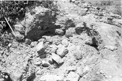 Detail of adobe and rock masonry in huaqueo along southeast side of main structure at Site 143