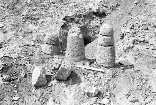 Conical and sectioned conical adobes at south edge of south platform at Site 146