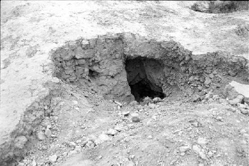 Construction detail of huaqueo on mound in southwest corner at Site 158