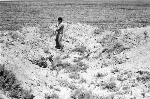 Central huaqueo and possible tapia at Site 162