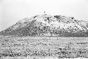 Southeast corner and south side of huaca at Site 177