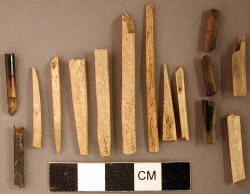 Worked animal bone fragments, including some perforators; some fragments crossmend