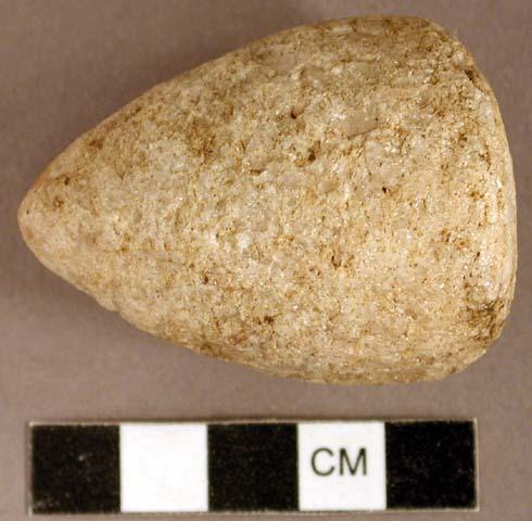 Ground stone, quartz conical object