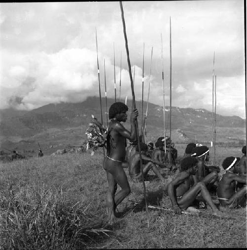 Men waiting with spears