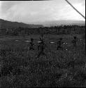 Men running to battle line