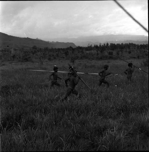 Men running to battle line