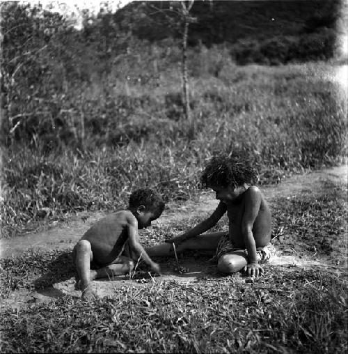 Holake and a little boy playing