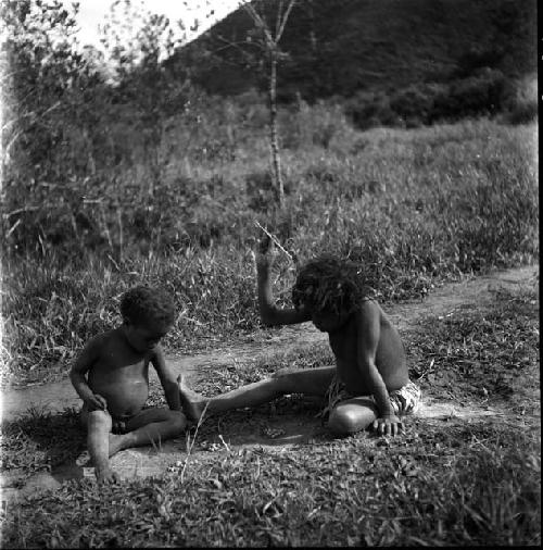 Holake and a little boy playing