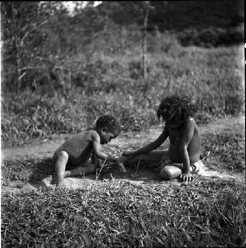 Holake and a little boy playing