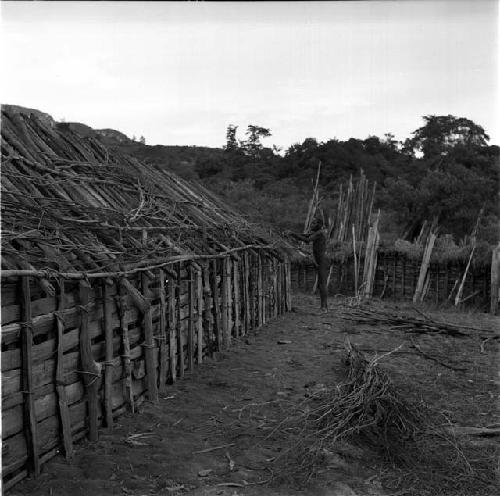 Asokmeke working on roof