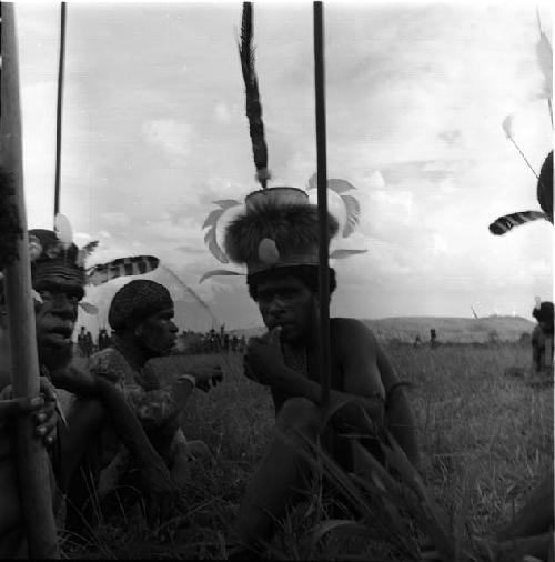 men seated in front of oléa