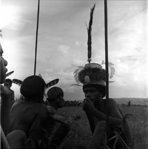 men seated in front of oléa