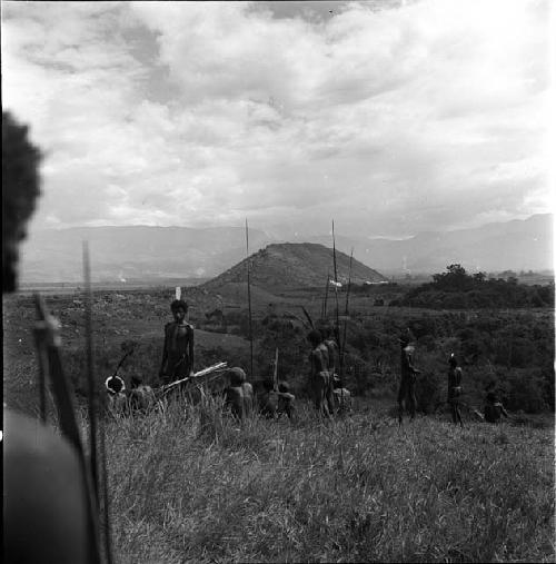 men watching the enemy