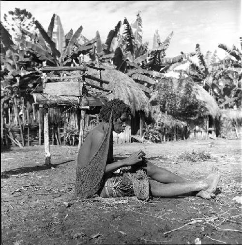 Woman waits beside the pia