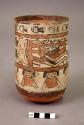 Vase painted in polychrome with mythical beings, human figures, and faces