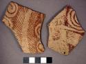 Ceramic body sherds, exterior red on buff circular and linear design