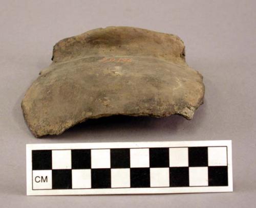 Ceramic rim sherd, flared lip, black interior