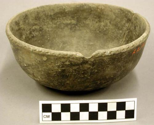 Ceramic bowl, punctate/notched pattern on outside rim, rim chipped, body cracked