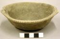 Complete ceramic bowl, notched rim decoration, 4 perforations on rim, plain