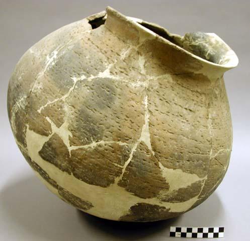 Ceramic jar, flared rim, corrugated, reconstructed