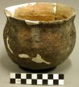 Ceramic complete vessel, mended, plain, flared rim