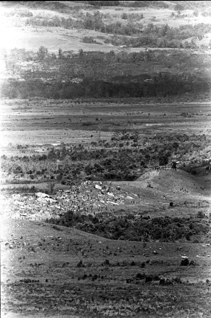 Distant view of men on the Warabara