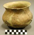 Ceramic complete vessel, plain, flared rim, heavily mended and reconstructed