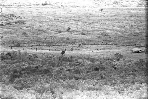 Wounded men being brought back to the Liberek (clearing used for celebratory dances)