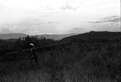 Spearman making his way through the marsh on the end of the Tokolik